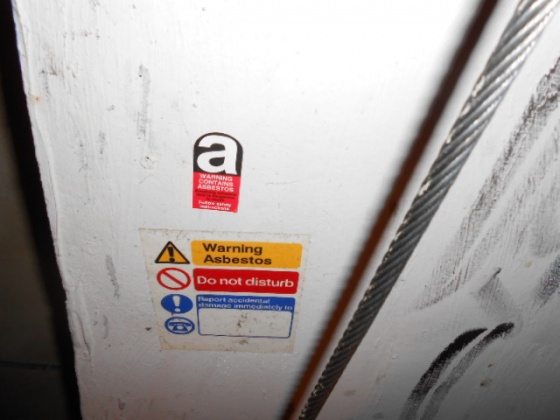 Asbestos Surveys & Advice - Asbestos in a lift shaft