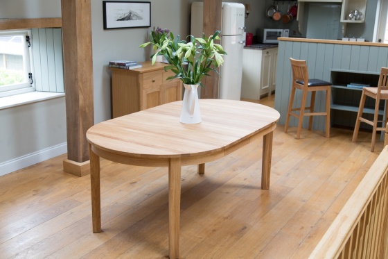 Top Furniture Ltd Dartford - Baltic oak round extending tables
